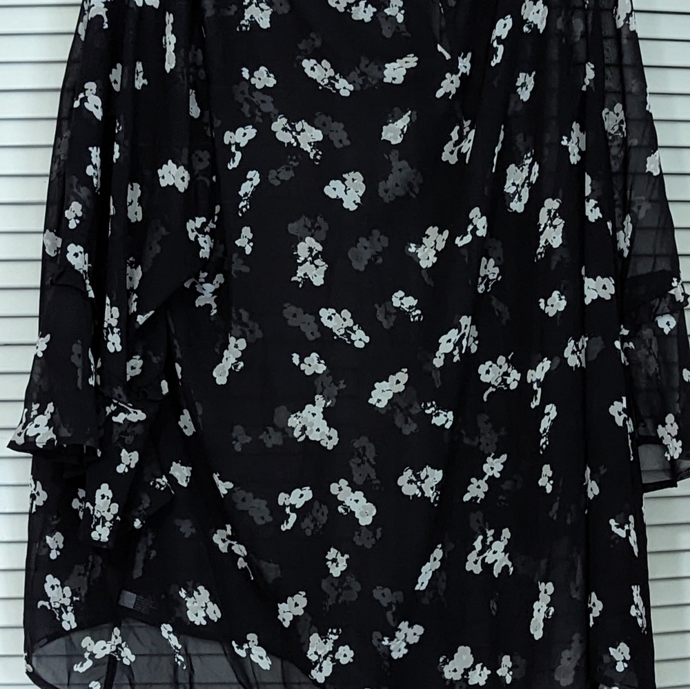 Lane Bryant sheer black and white ruffled sleeved blouse. Size 24